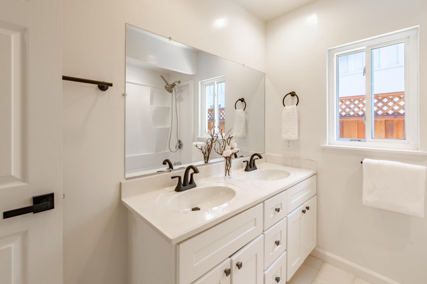 30432 Treeview Street Hayward, CA 94544 - Photo 15 of 35 a bathroom with double sink and a window