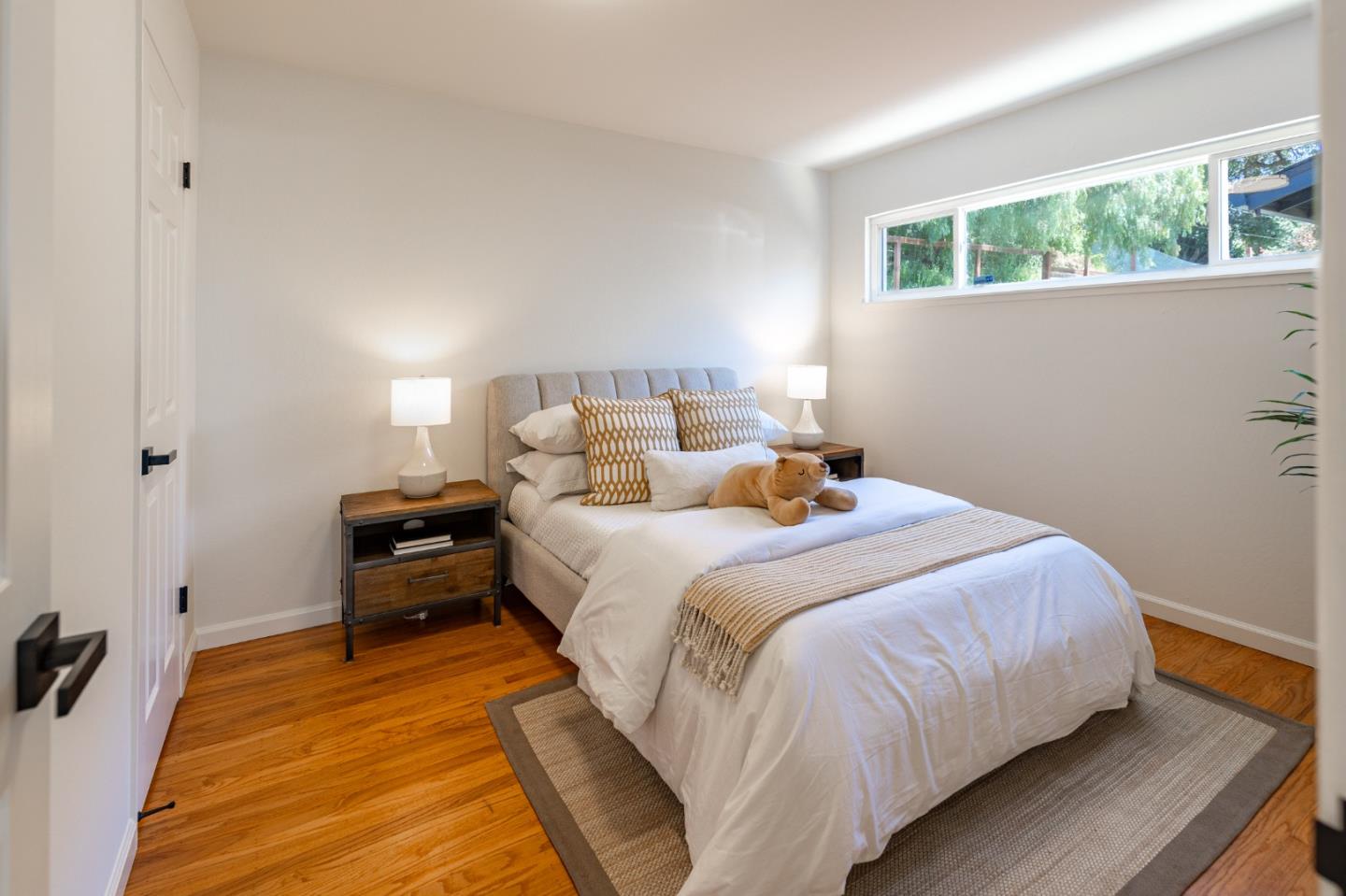 30432 Treeview Street Hayward, CA 94544 - Photo 16 of 35 a bedroom with a bed and a window