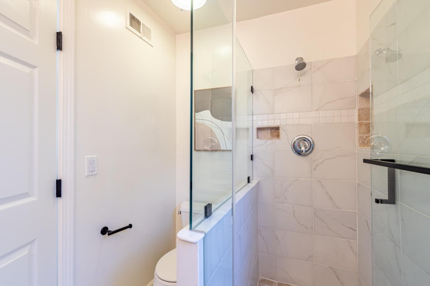 30432 Treeview Street Hayward, CA 94544 - Photo 20 of 35 a bathroom with a shower and toilet