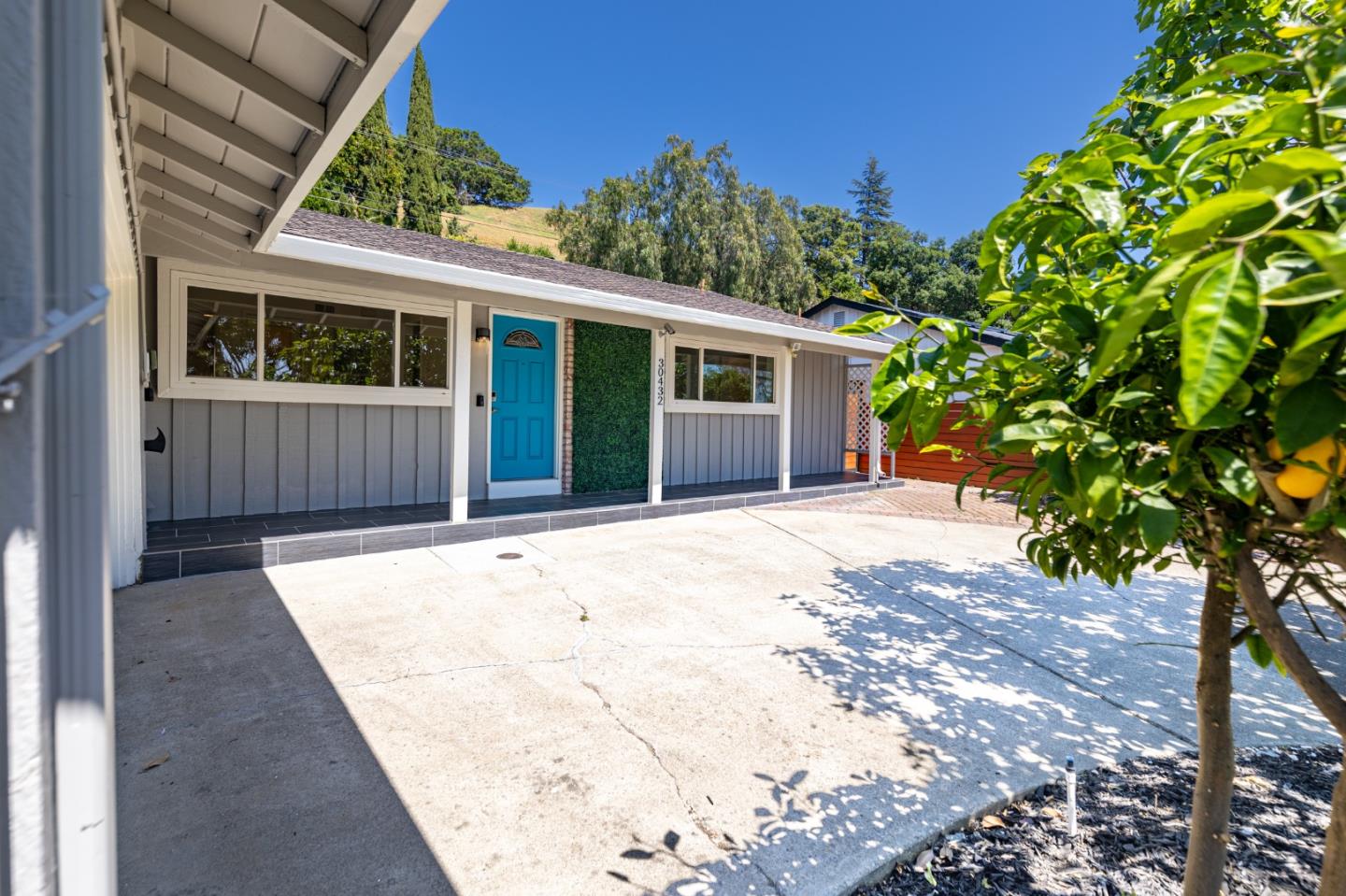 30432 Treeview Street Hayward, CA 94544 - Photo 2 of 35 a view of a house with a tree in front of it