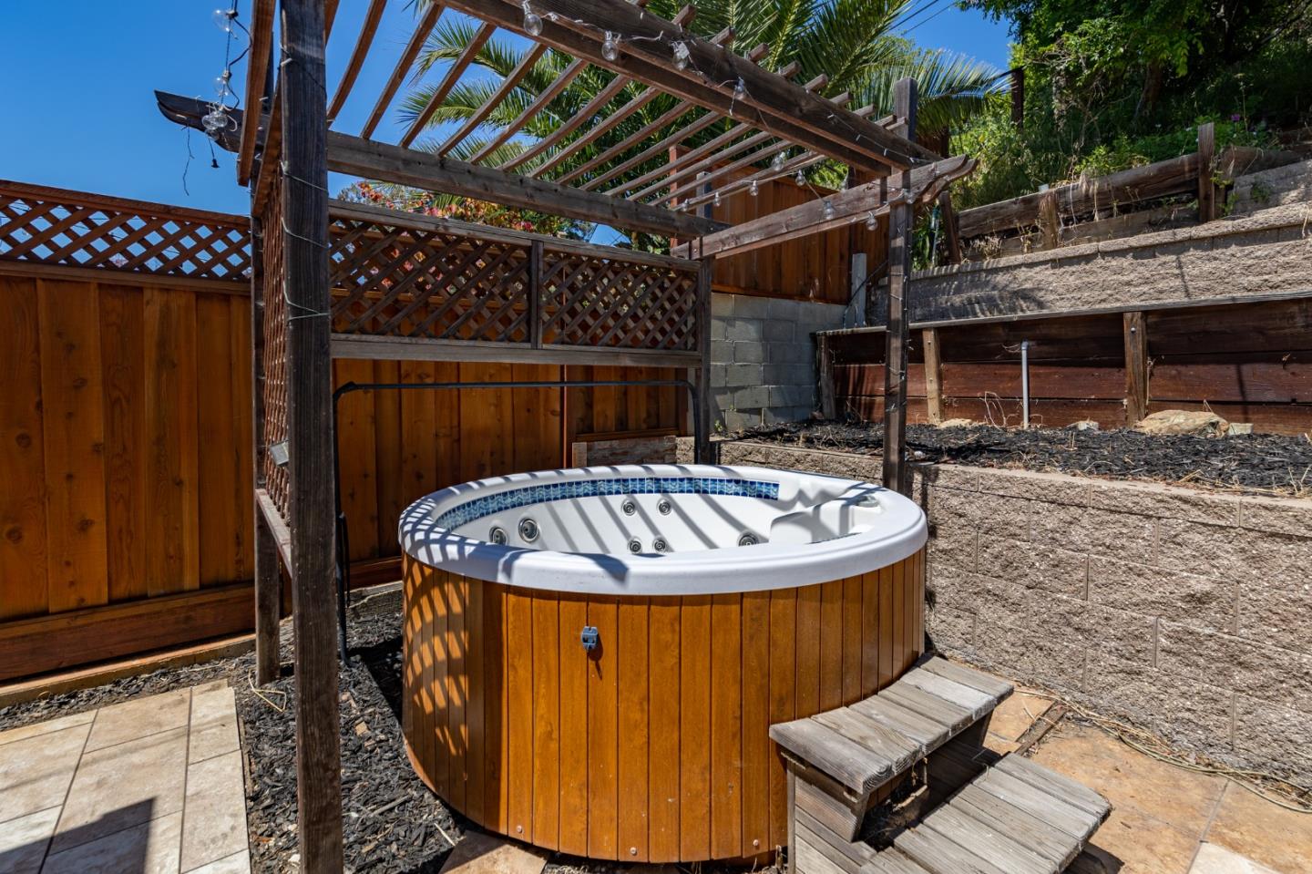 30432 Treeview Street Hayward, CA 94544 - Photo 29 of 35 a view of a back yard with a wooden fence