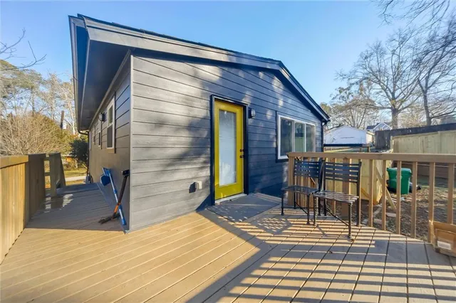 a bedroom with a bed and a walk in closet