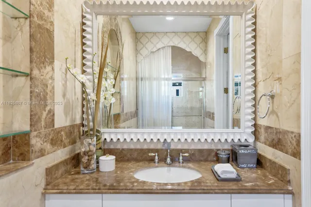 a kitchen with stainless steel appliances granite countertop a table and a sink