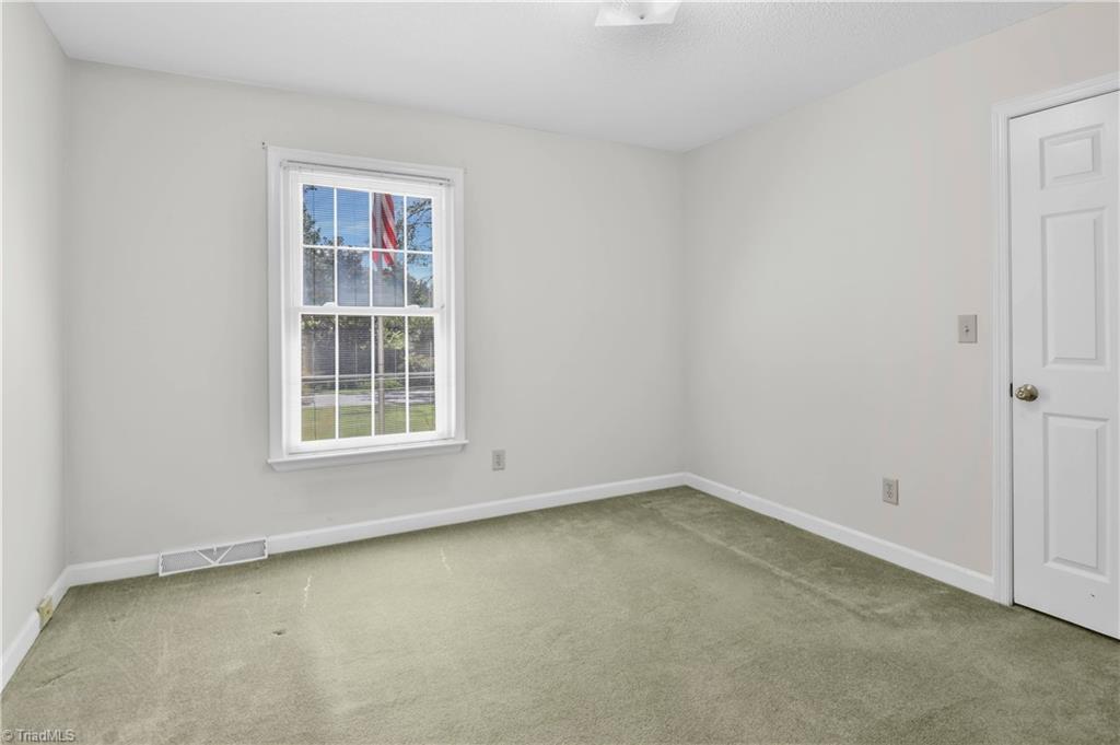 546 Drumheller Road Clemmons, NC 27012 - Photo 20 of 29 One of two secondary bedrooms on the main level.