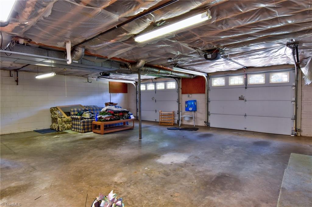 546 Drumheller Road Clemmons, NC 27012 - Photo 25 of 29 2-car garage with insulated doors and whisper quiet belt drives.
