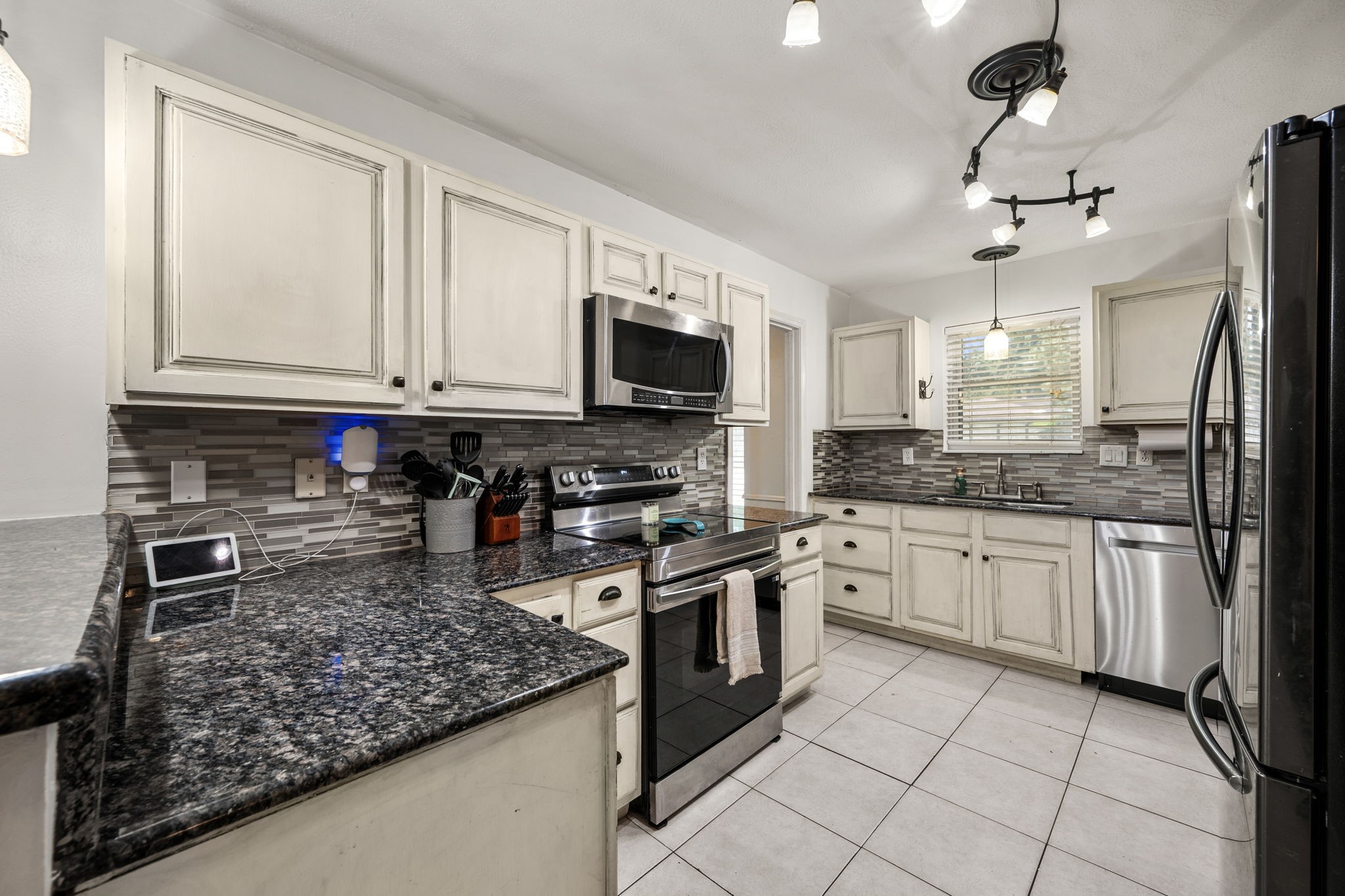 2415 Whispering Springs Drive Spring, TX 77373 - Photo 10 of 28 Recently updated kitchen appliances