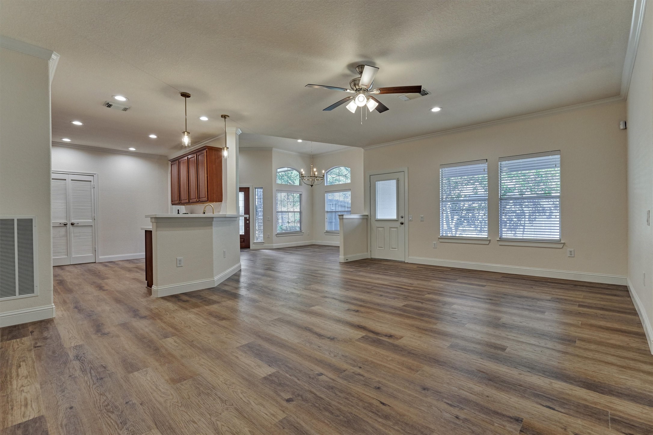 6 Windsor Bridge Drive Conroe, TX 77384 - Photo 23 of 46 a view of a kitchen with an empty space and a window