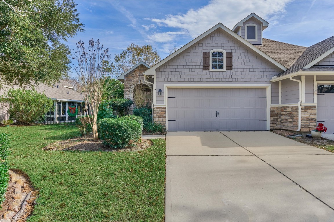 6 Windsor Bridge Drive Conroe, TX 77384 - Photo 3 of 46 Front elevation of the home with lovely stacked stone facade.