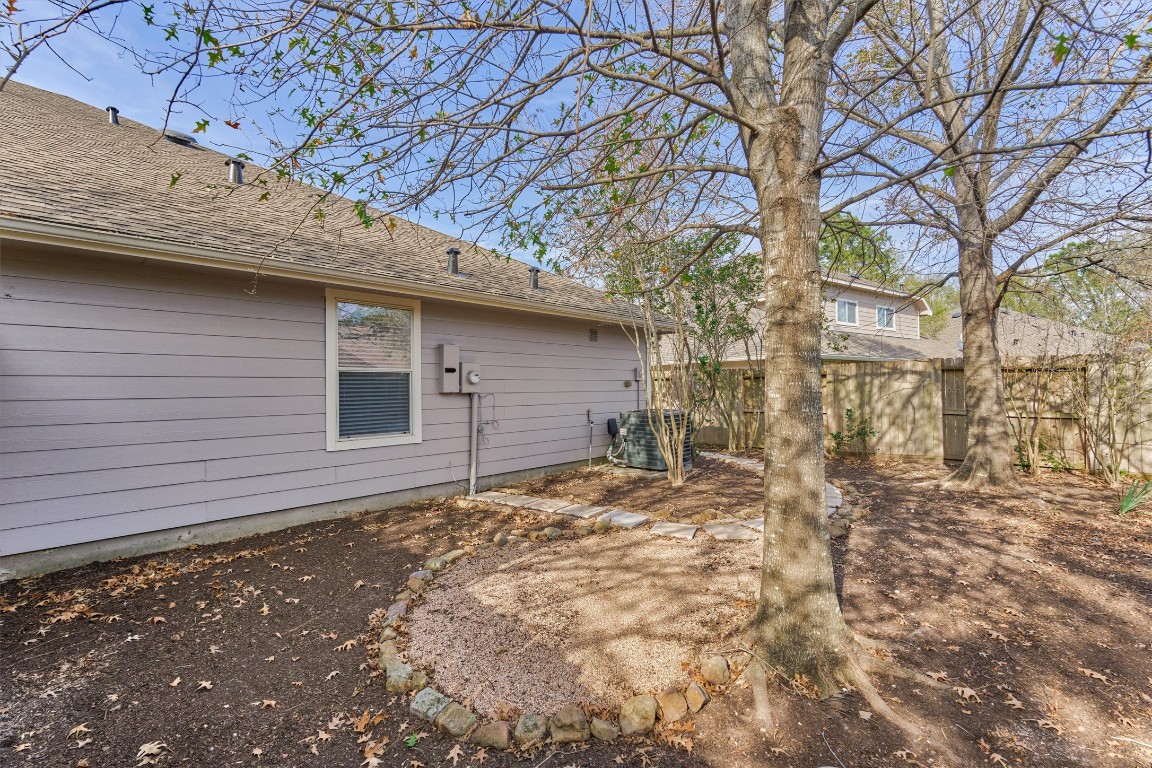 6 Windsor Bridge Drive Conroe, TX 77384 - Photo 35 of 46 The backyard is so private and has plenty of space to create or design your own outdoor garden.