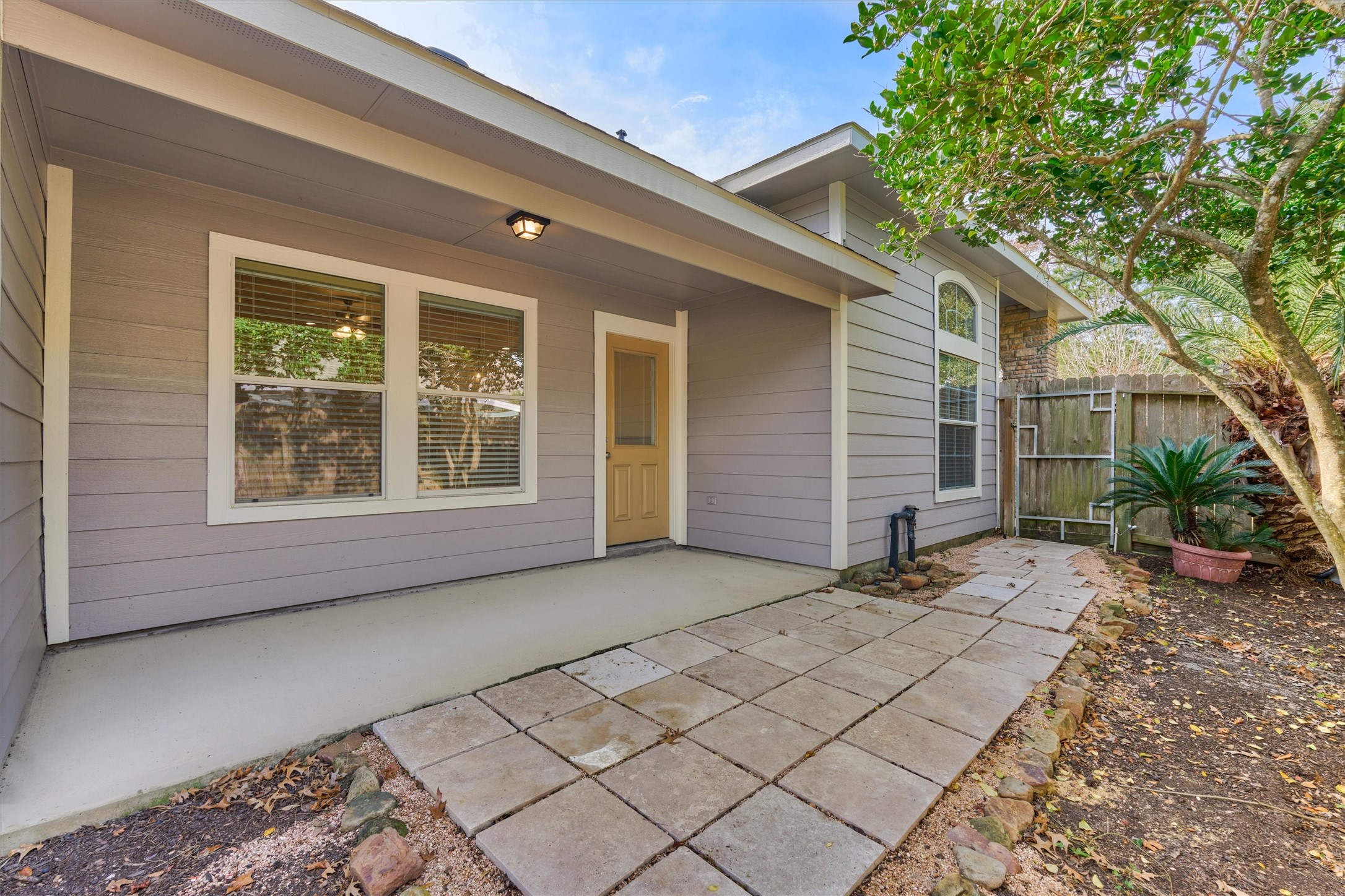 6 Windsor Bridge Drive Conroe, TX 77384 - Photo 37 of 46 a view of backyard with large tree