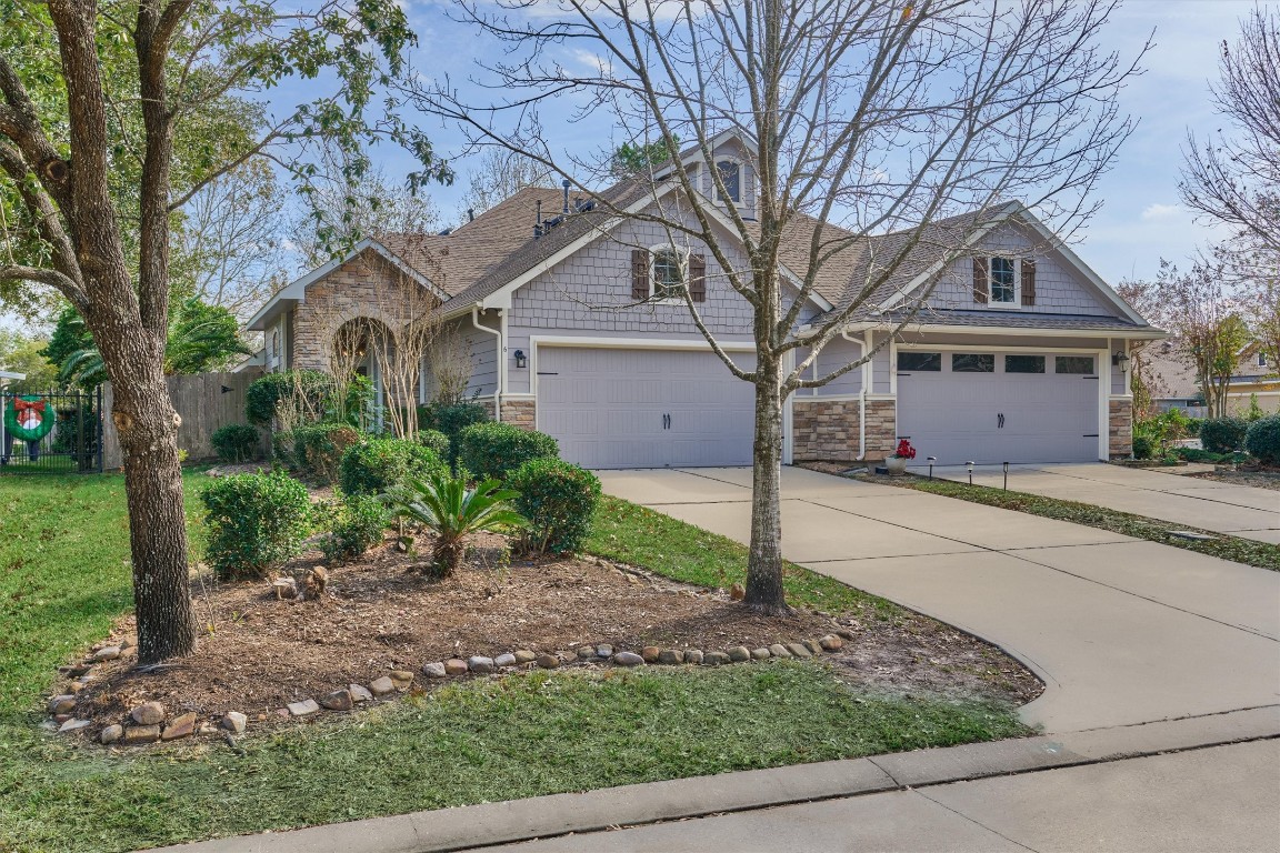 6 Windsor Bridge Drive Conroe, TX 77384 - Photo 39 of 46 The home has a large green space to the front, side and rear providing more privacy.