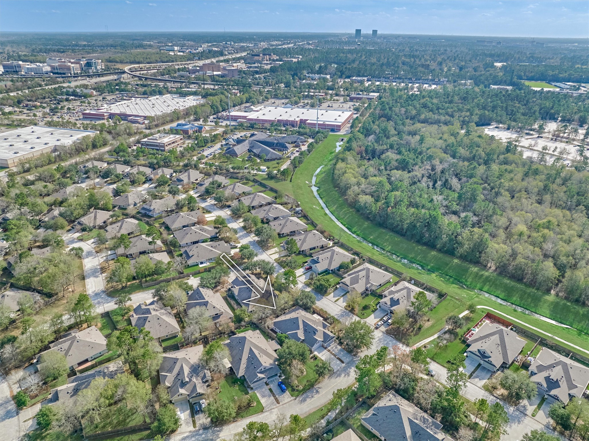 6 Windsor Bridge Drive Conroe, TX 77384 - Photo 41 of 46 an aerial view of residential houses with outdoor space