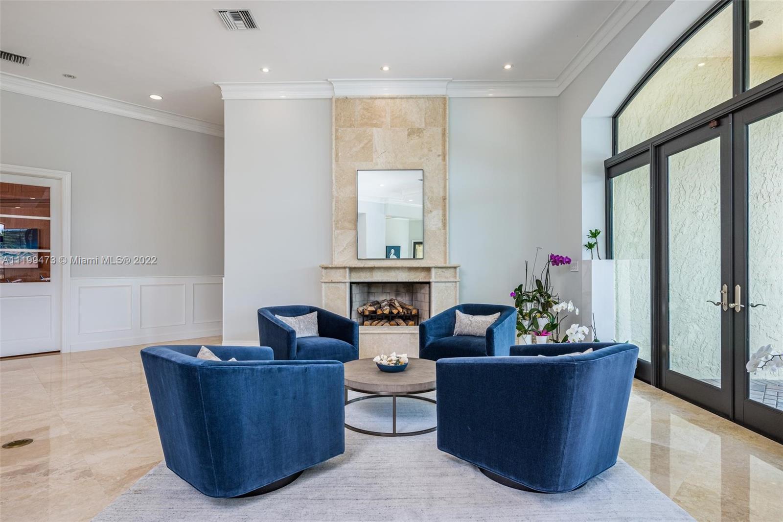 3510 Windmill Ranch Road Weston, FL 33331 - Photo 11 of 59 a living room with furniture and flowers
