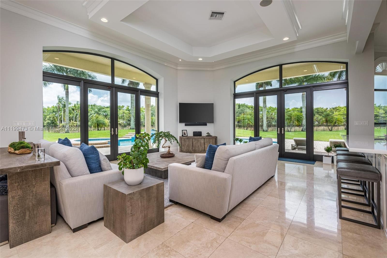 3510 Windmill Ranch Road Weston, FL 33331 - Photo 12 of 59 a living room with furniture and a large window