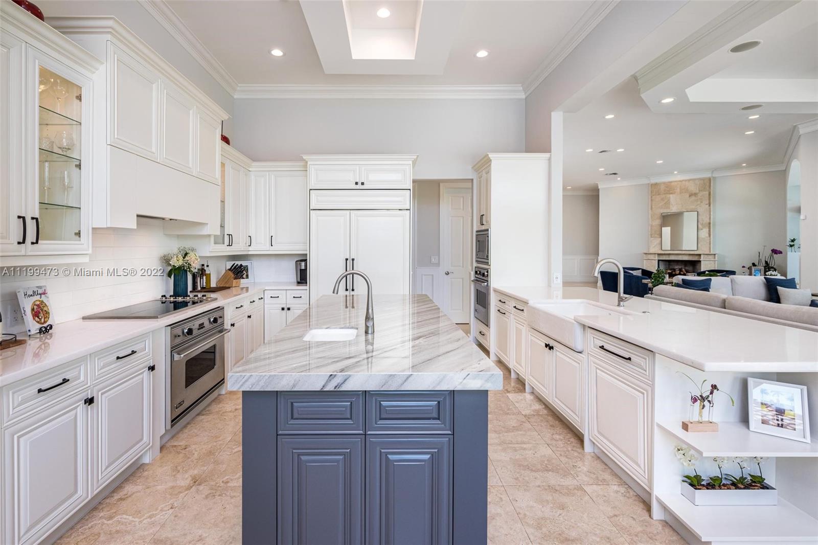 3510 Windmill Ranch Road Weston, FL 33331 - Photo 17 of 59 a large kitchen with granite countertop lots of counter space and sink