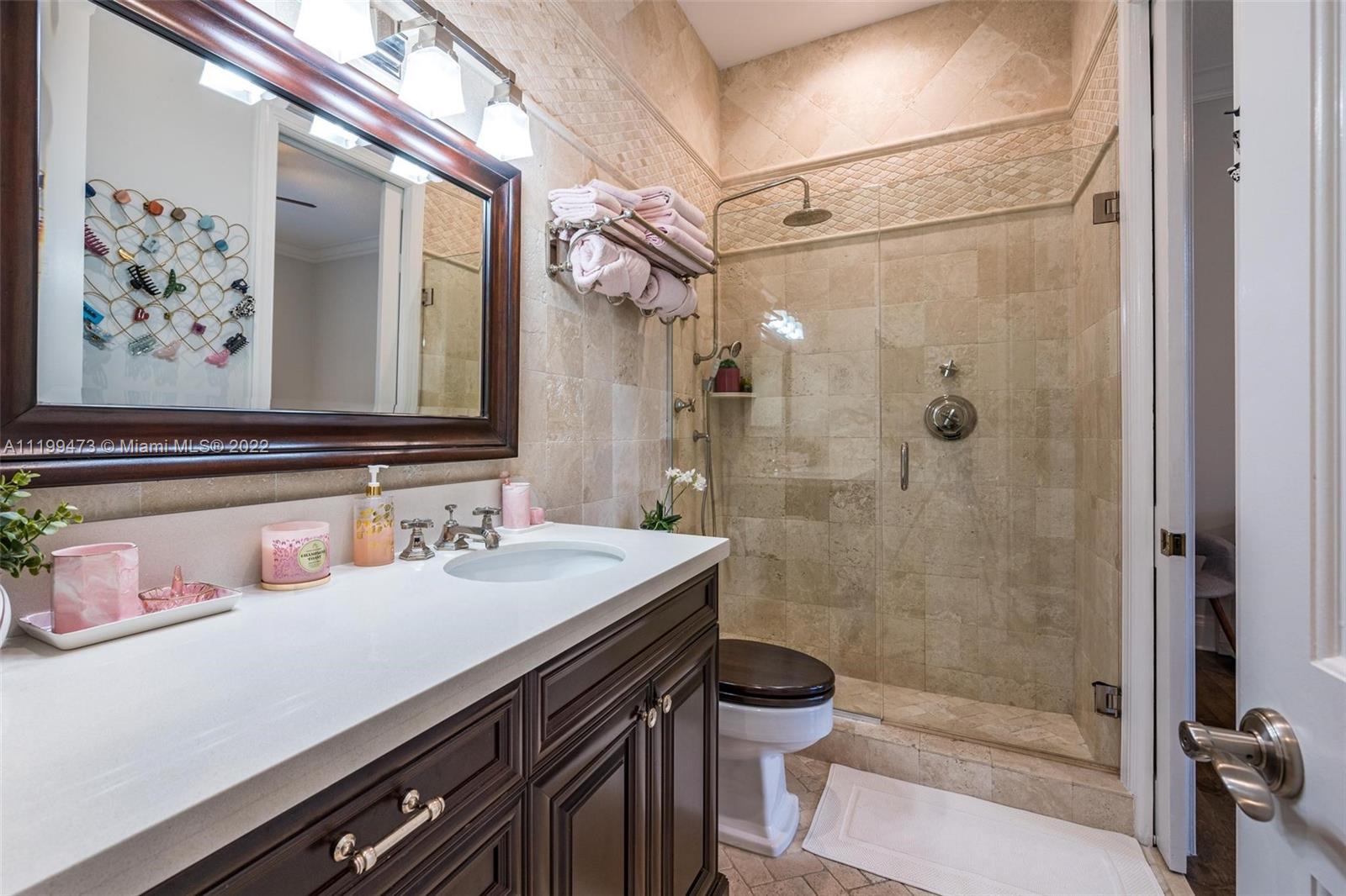 3510 Windmill Ranch Road Weston, FL 33331 - Photo 29 of 59 a bathroom with a sink and a mirror