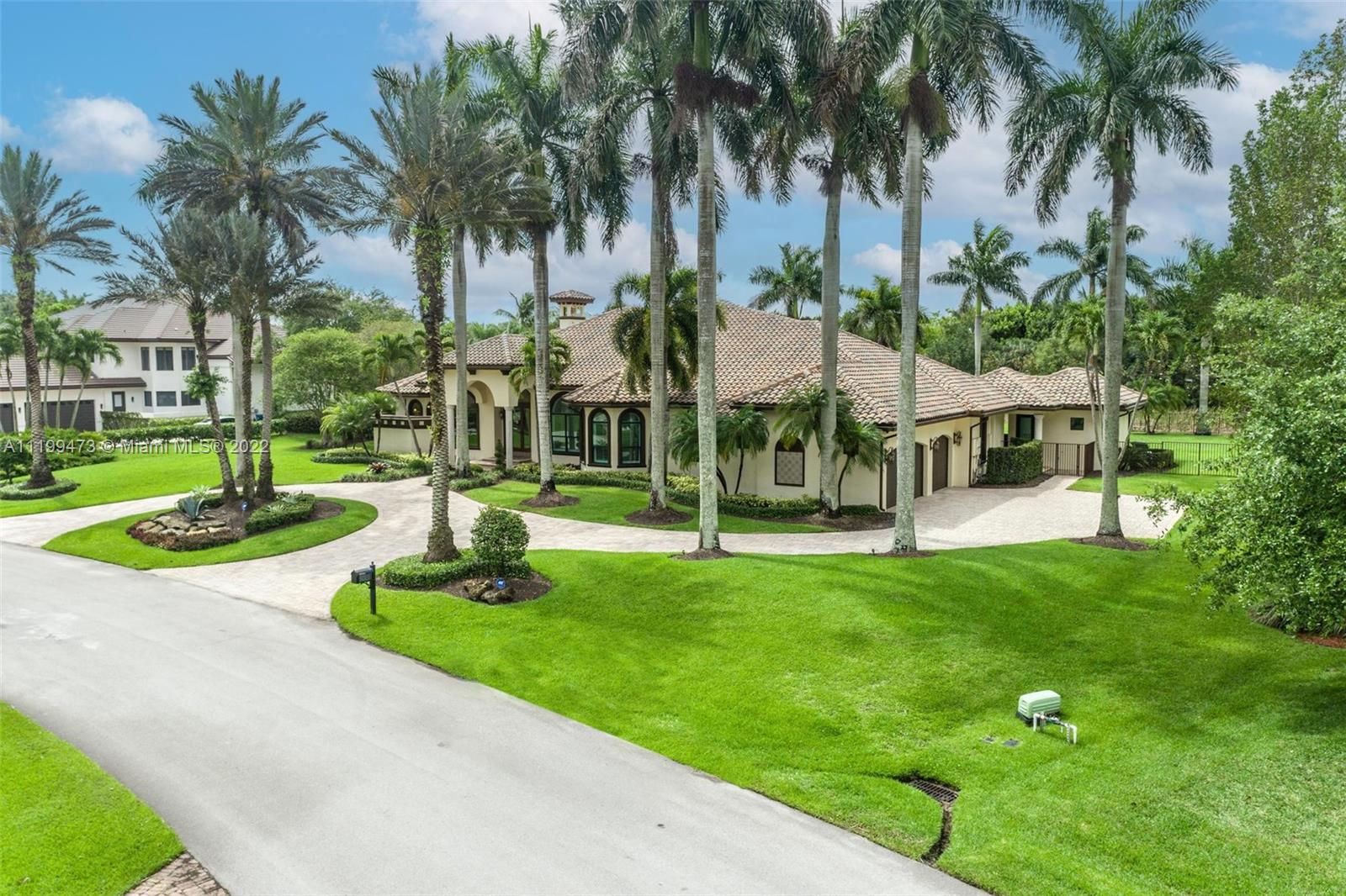 3510 Windmill Ranch Road Weston, FL 33331 - Photo 54 of 59 a view of a park with palm trees