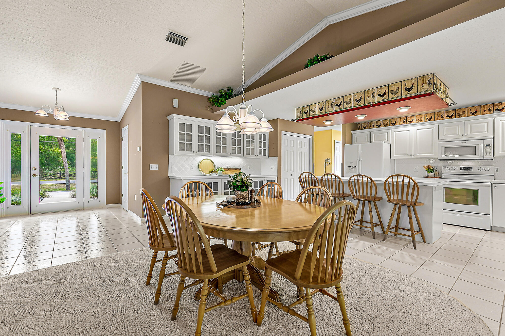 3240 Weber Road Malabar, FL 32950 - Photo 13 of 47 a dining room with furniture and window