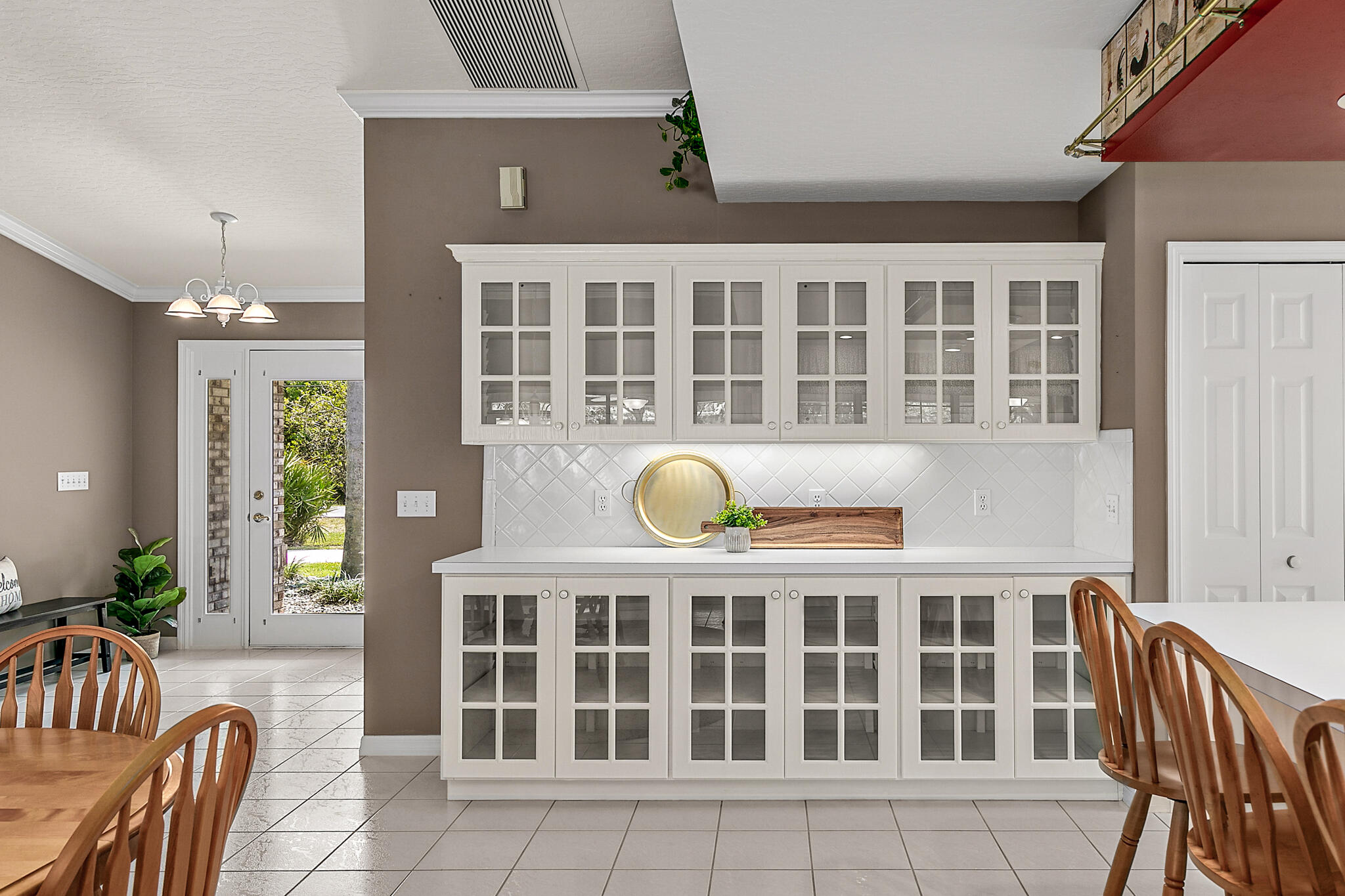 3240 Weber Road Malabar, FL 32950 - Photo 15 of 47 a view of a building and outdoor seating