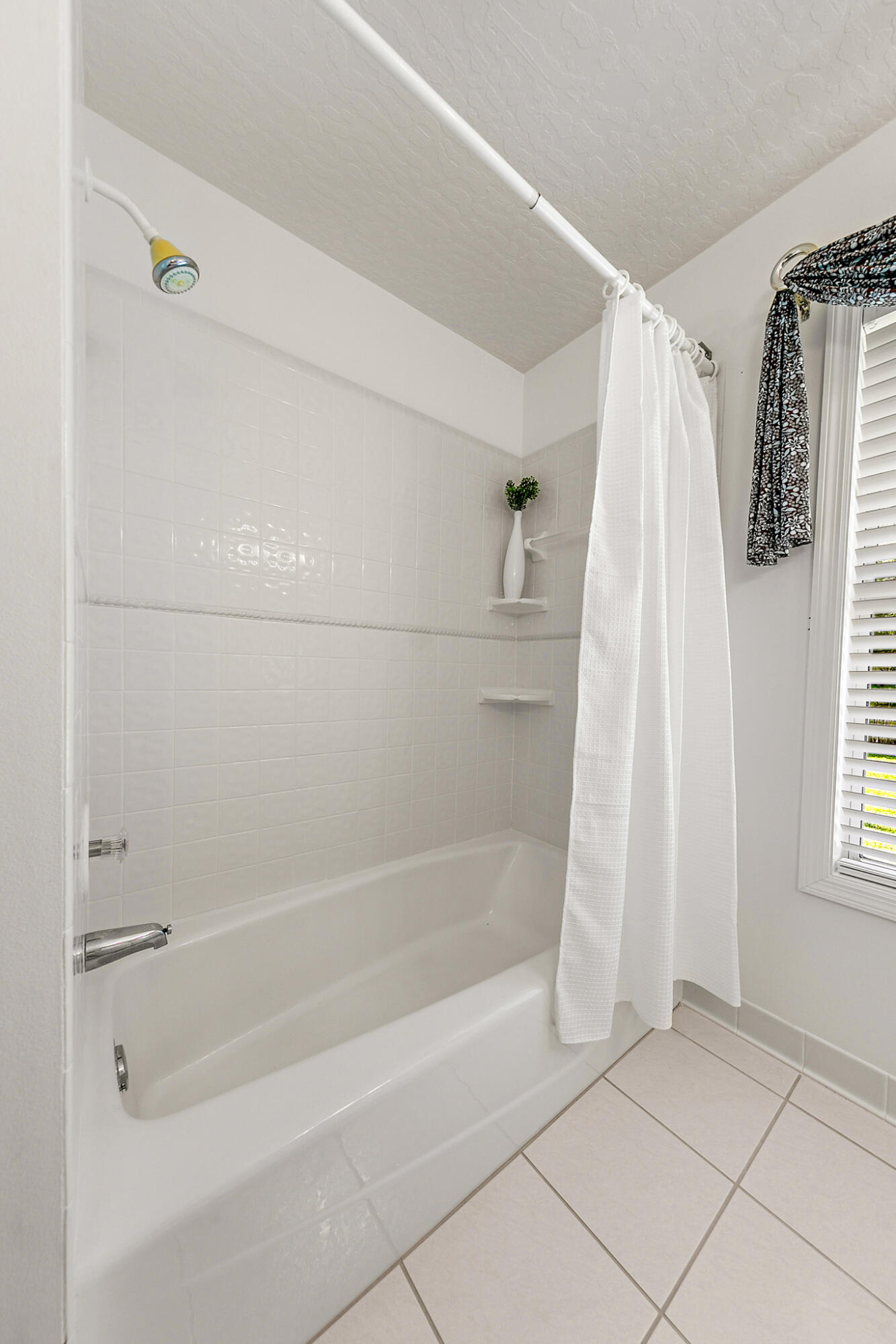3240 Weber Road Malabar, FL 32950 - Photo 24 of 47 a bathroom with a shower a bath tub and a shower