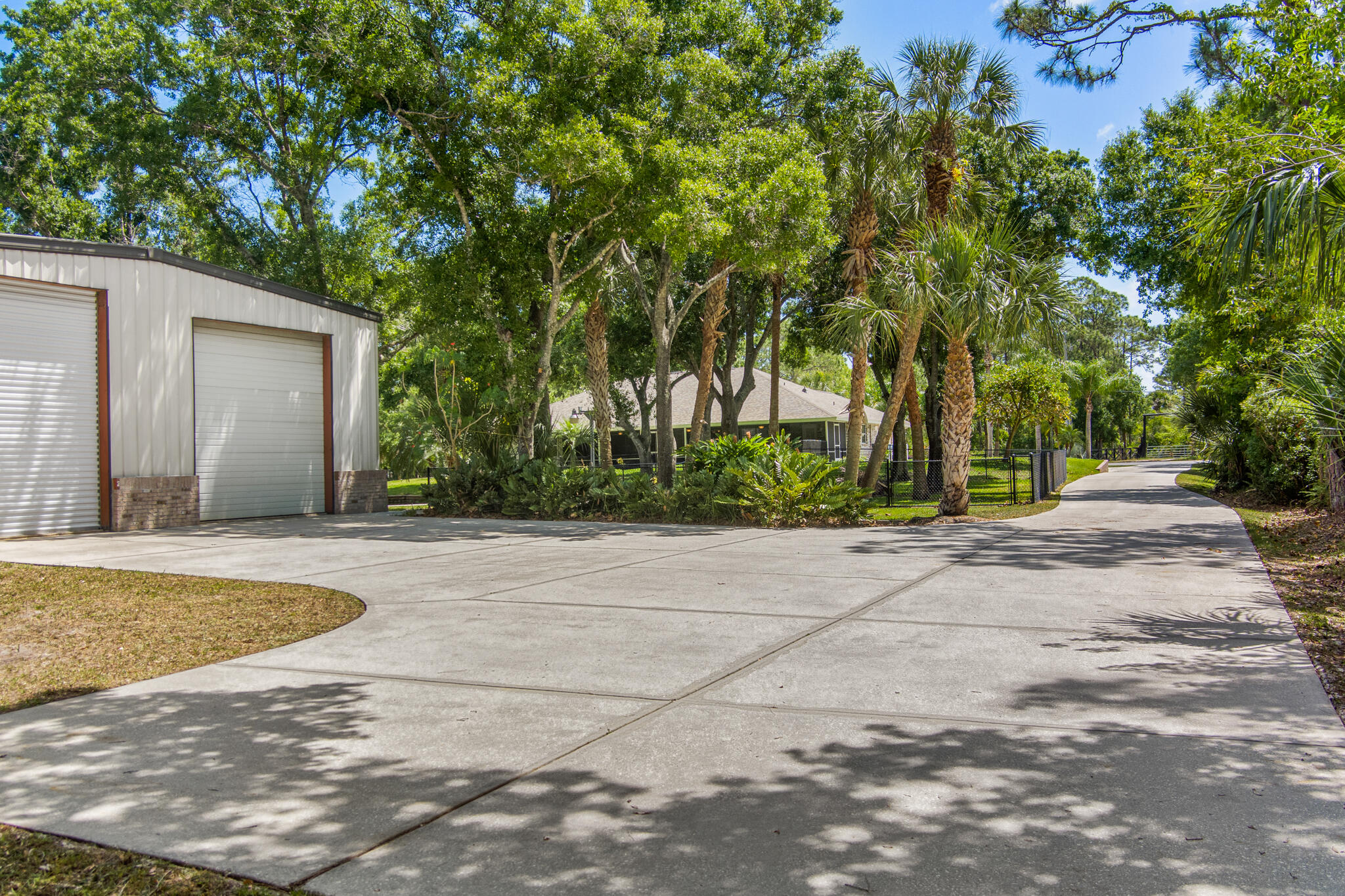 3240 Weber Road Malabar, FL 32950 - Photo 37 of 47 a view of a backyard with large trees