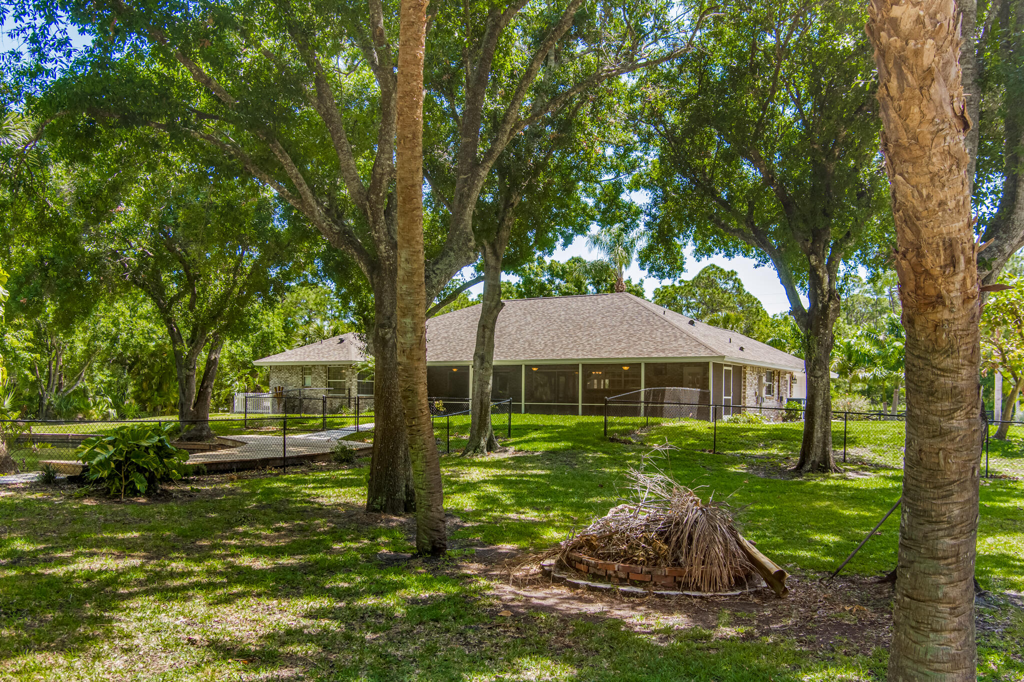 3240 Weber Road Malabar, FL 32950 - Photo 43 of 47 a view of a house with a yard