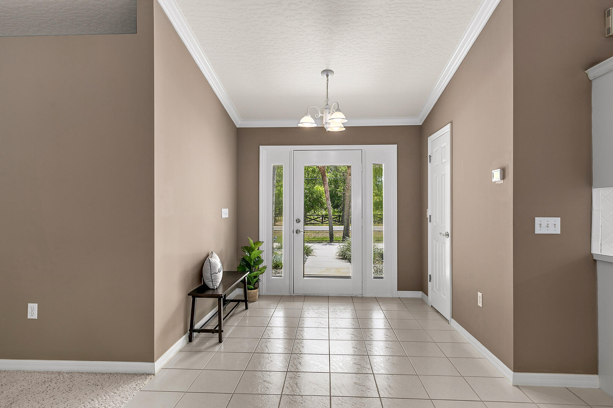 3240 Weber Road Malabar, FL 32950 - Photo 9 of 47 a view of a entryway of a house