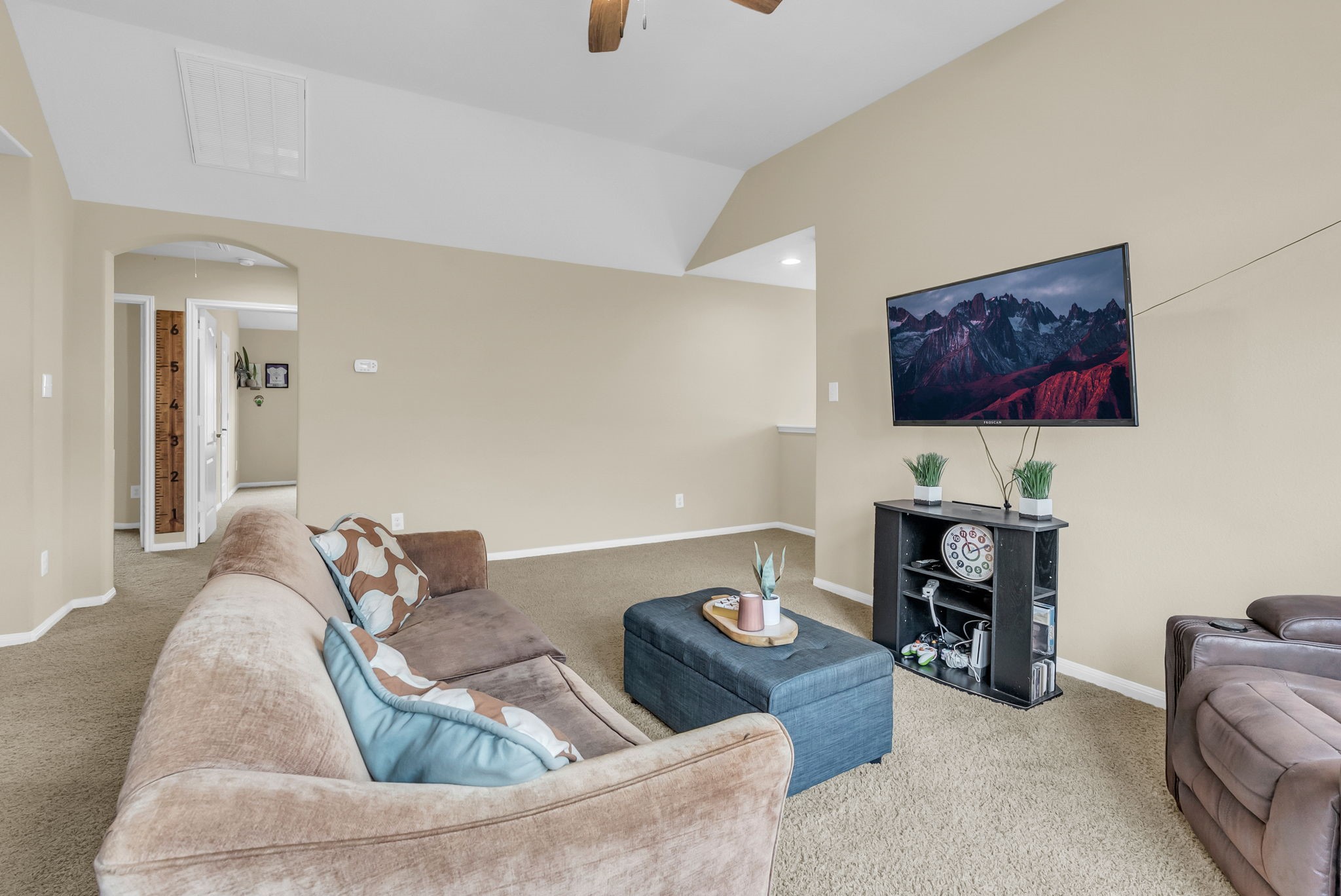 16619 Dover Mills Drive Spring, TX 77379 - Photo 25 of 49 a living room with furniture and a flat screen tv