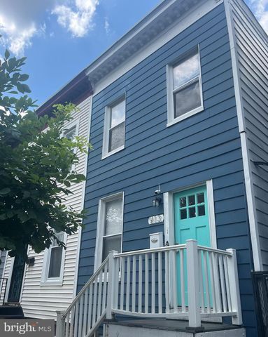 a front view of a house with a porch