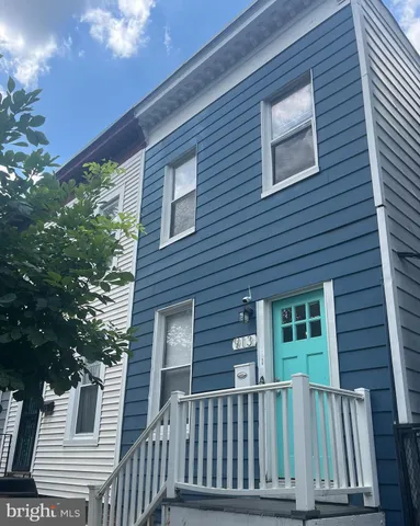 a front view of a house with a porch