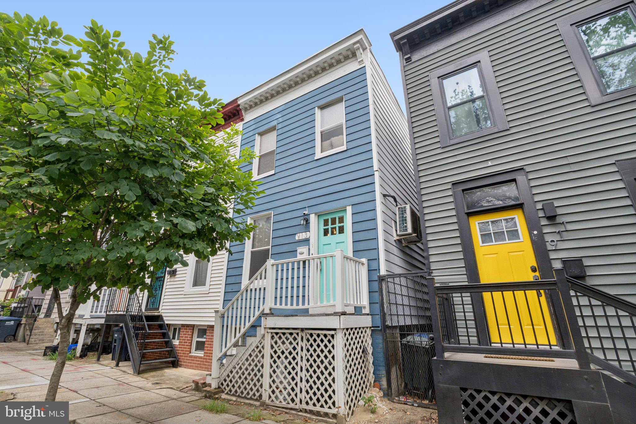 913 Columbia Road Northwest Washington, DC 20001 - Photo 35 of 37 a view of a brick house with many windows