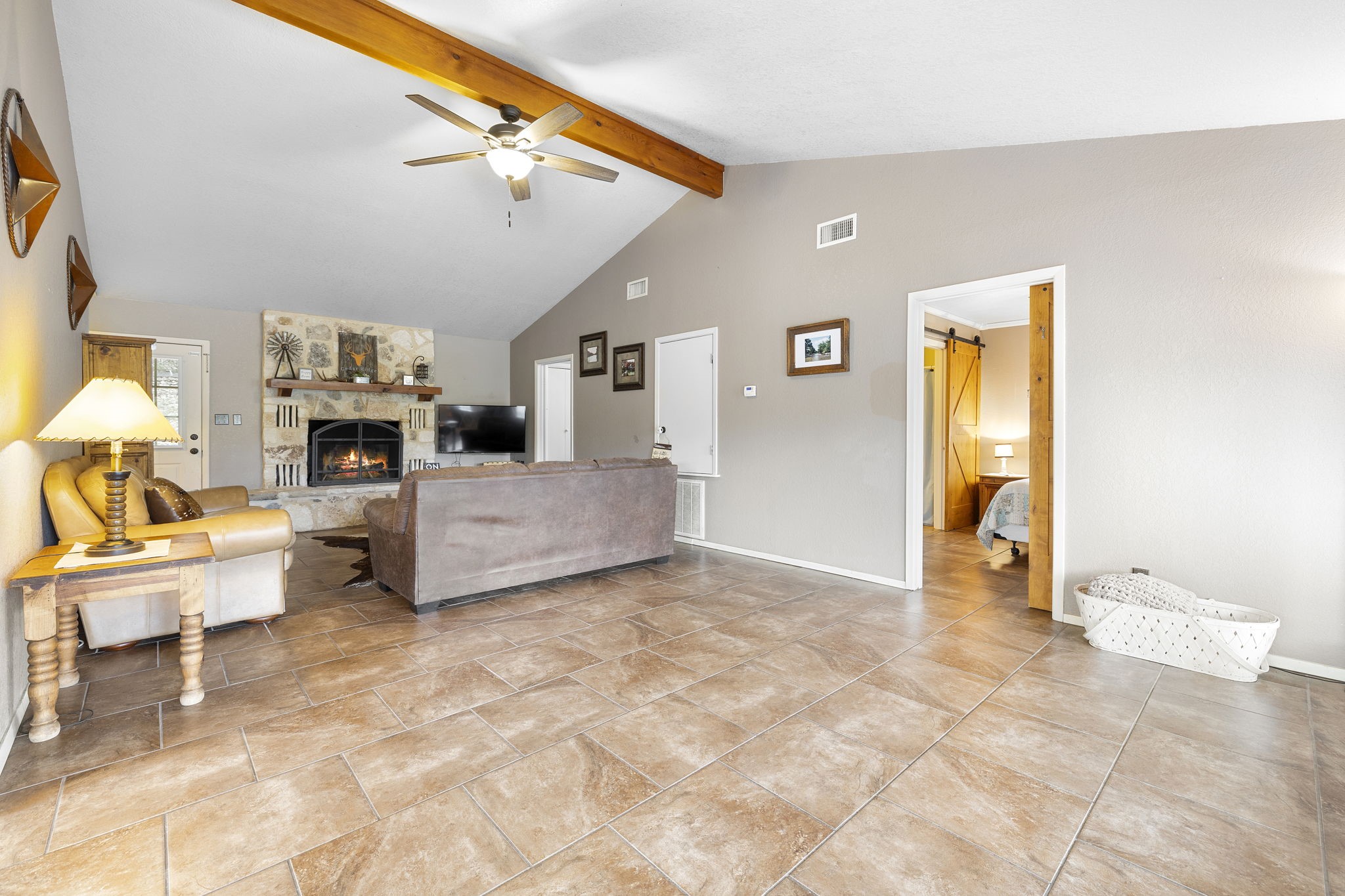 117 Cedar Rdg Lane Concan, TX 78838 - Photo 12 of 38 a view of a livingroom with furniture and a fireplace