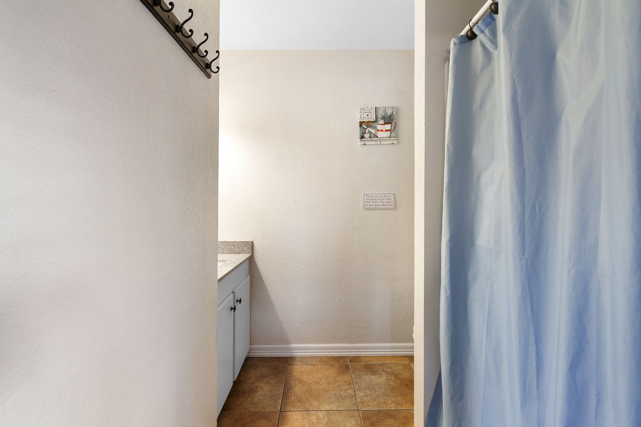 117 Cedar Rdg Lane Concan, TX 78838 - Photo 17 of 38 a bathroom with a shower