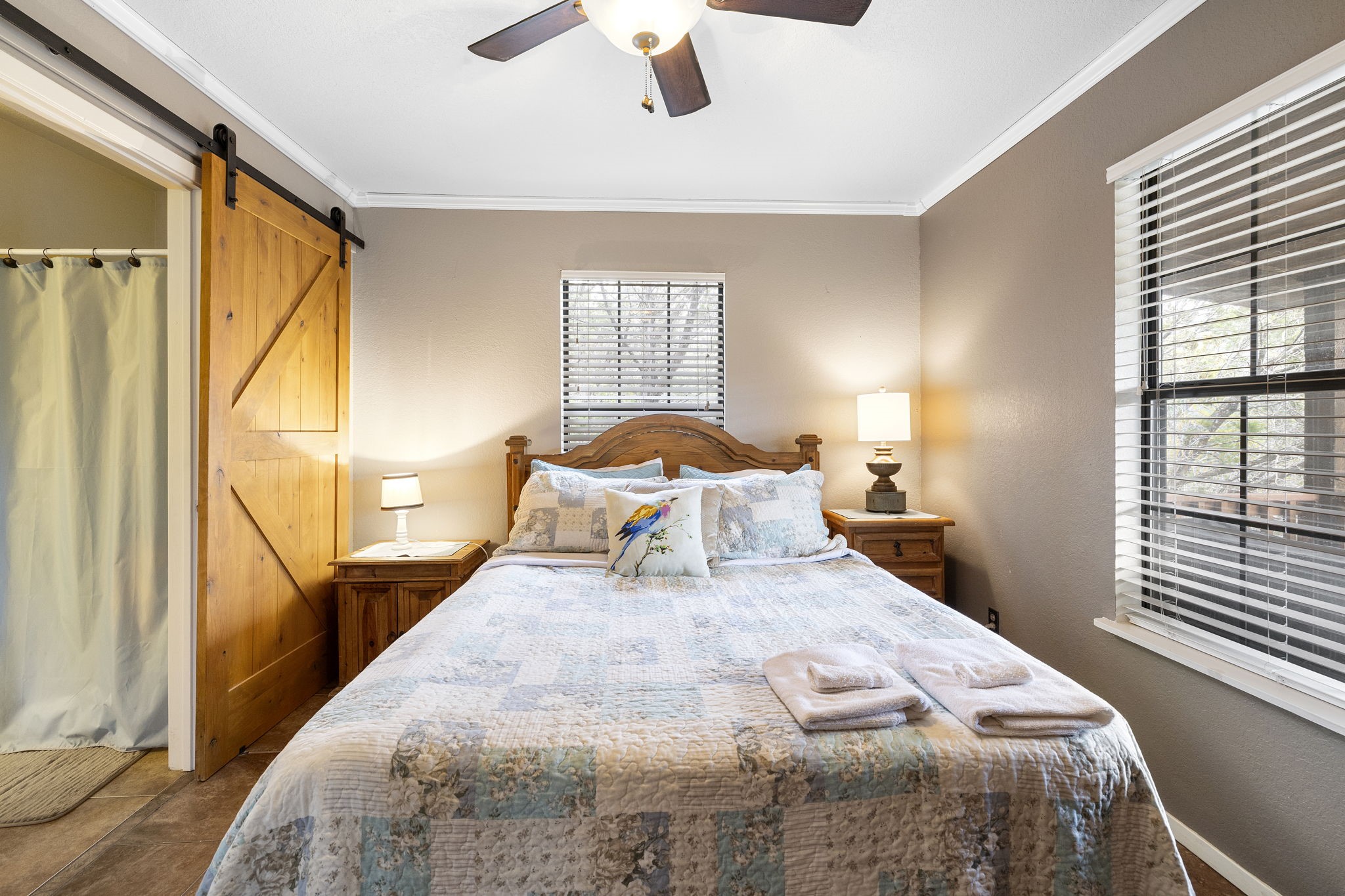 117 Cedar Rdg Lane Concan, TX 78838 - Photo 21 of 38 a bedroom with a bed and window