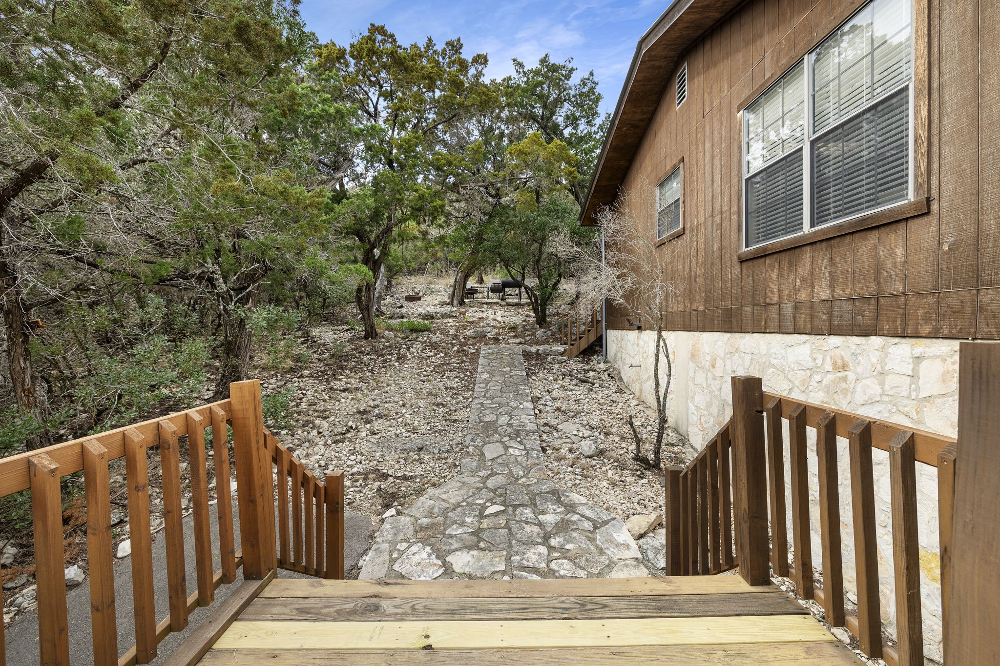 117 Cedar Rdg Lane Concan, TX 78838 - Photo 31 of 38 a view of a pathway of a house