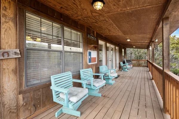 a view of deck with furniture and wooden floor
