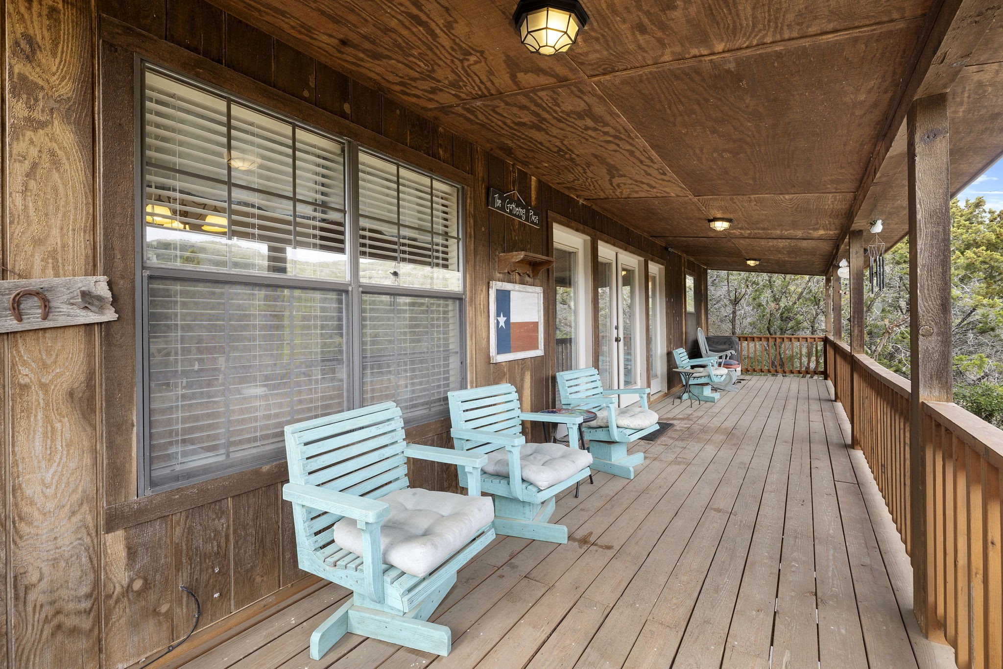 117 Cedar Rdg Lane Concan, TX 78838 - Photo 4 of 38 a view of deck with furniture and wooden floor