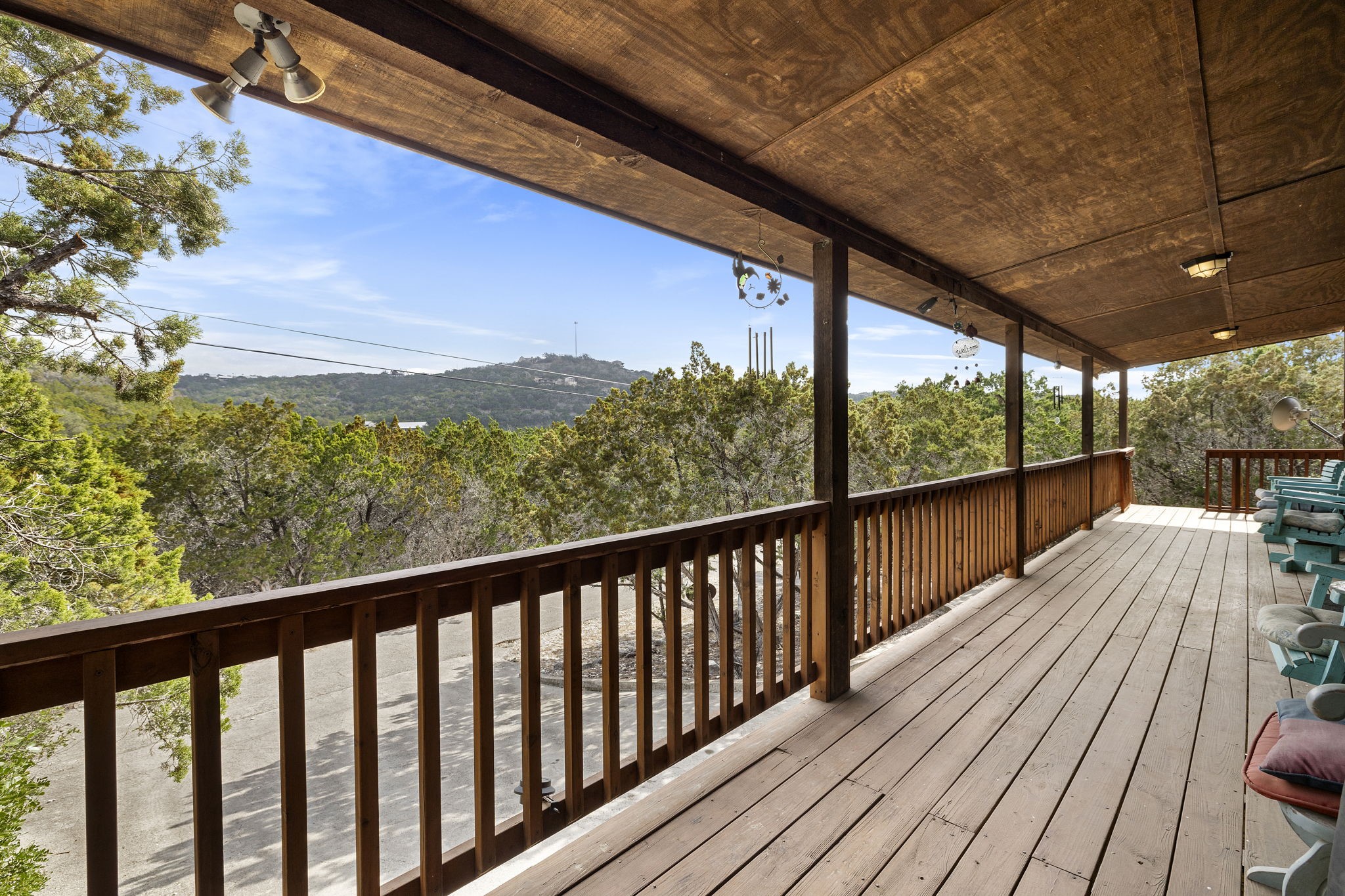 117 Cedar Rdg Lane Concan, TX 78838 - Photo 5 of 38 a view of balcony with wooden floor