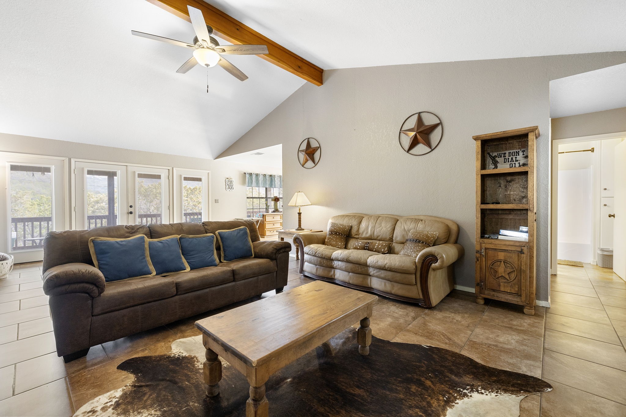 117 Cedar Rdg Lane Concan, TX 78838 - Photo 10 of 38 a living room with furniture and a rug