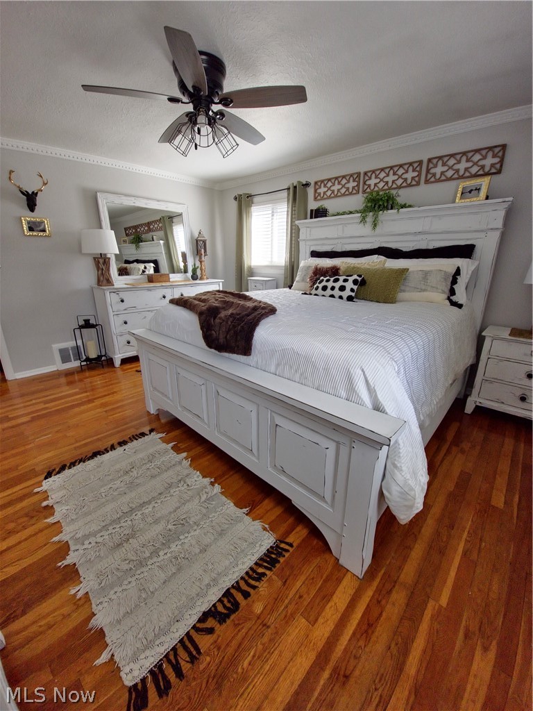 1681 Rush Road Wickliffe, OH 44092 - Photo 11 of 33 Bedroom with ornamental molding, ceiling fan, and wood-type flooring