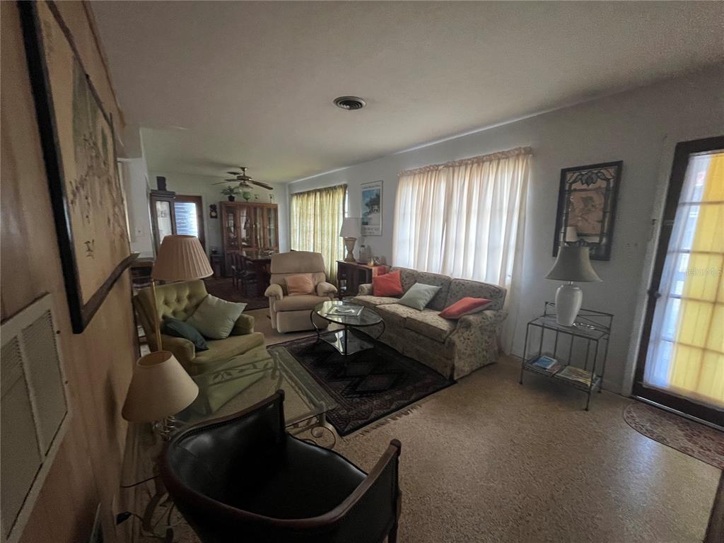505 Granada Avenue Venice, FL 34285 - Photo 12 of 30 a living room with furniture and a window