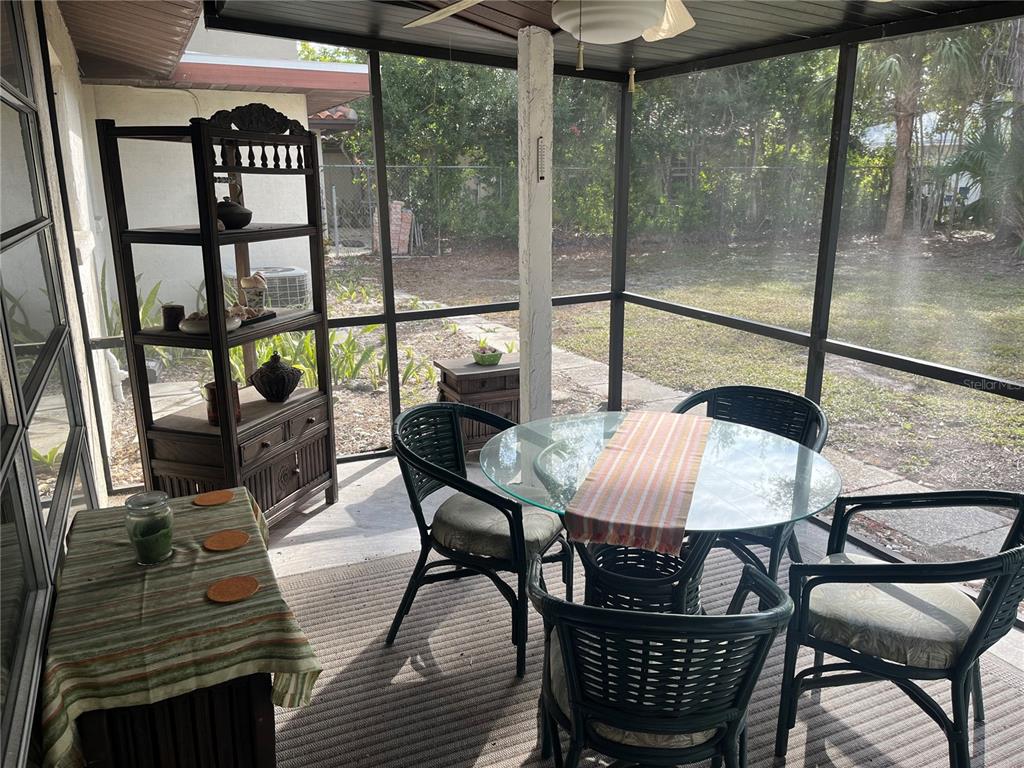 505 Granada Avenue Venice, FL 34285 - Photo 14 of 30 a view of a dining room with furniture window and outside view