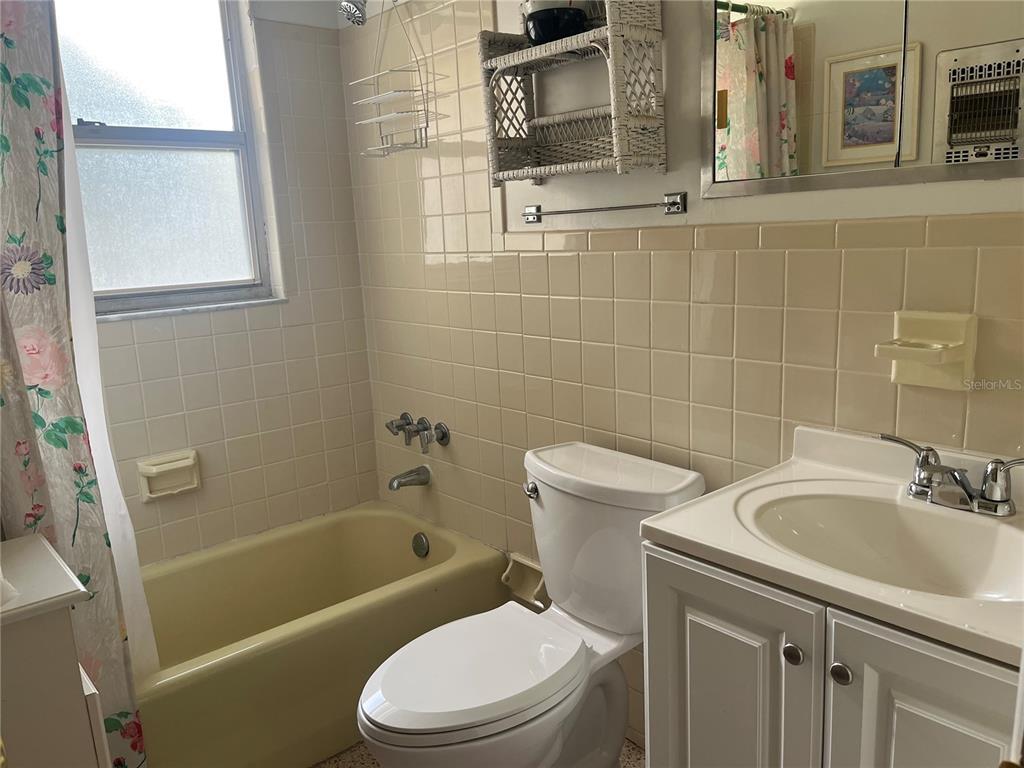 505 Granada Avenue Venice, FL 34285 - Photo 15 of 30 a bathroom with a sink a toilet and shower