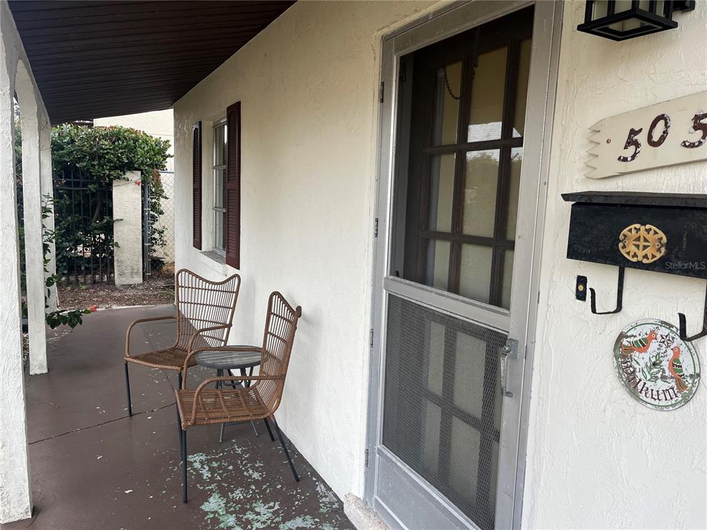 505 Granada Avenue Venice, FL 34285 - Photo 2 of 30 a view of a hallway with furniture and front door