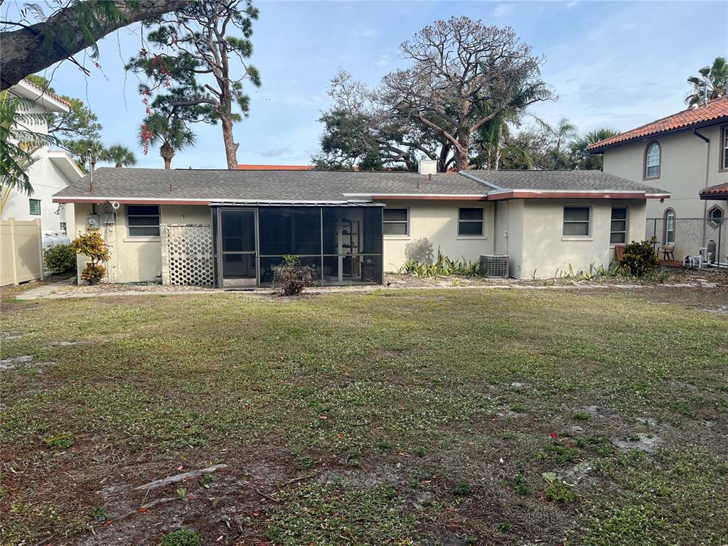 505 Granada Avenue Venice, FL 34285 - Photo 22 of 30 a front view of a house with a yard