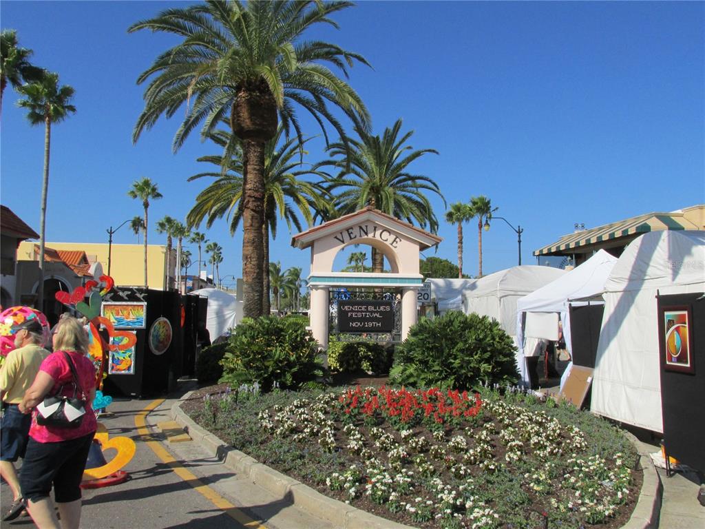 505 Granada Avenue Venice, FL 34285 - Photo 27 of 30 a front view of house with yard and trees around