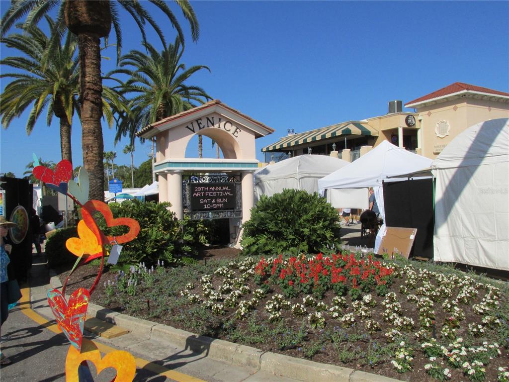 505 Granada Avenue Venice, FL 34285 - Photo 29 of 30 front view of a house with a yard