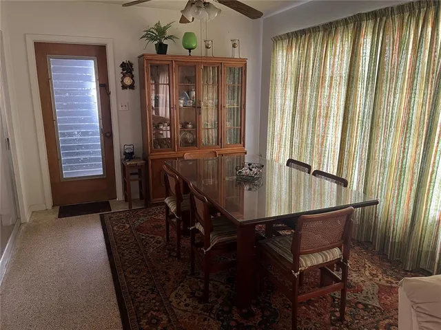 a kitchen with a sink stove and refrigerator
