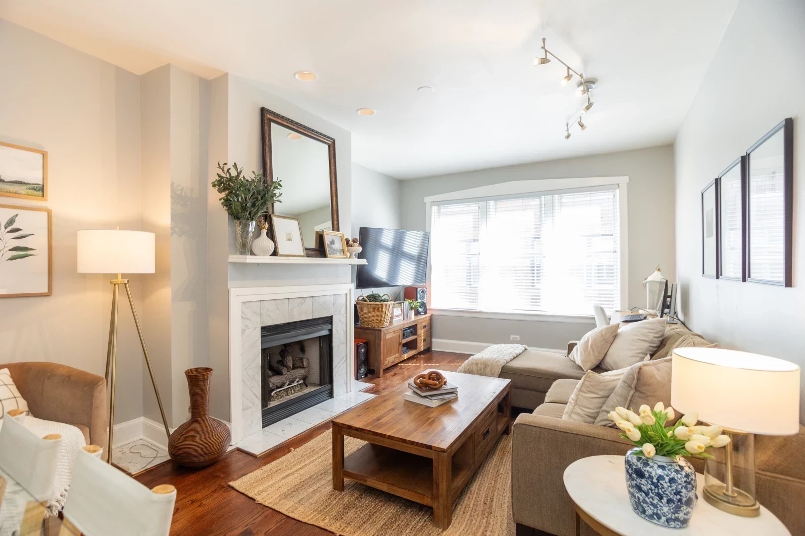 2026 North Burling Street, Unit 208 Chicago, IL 60614 - Photo 3 of 14 a living room with furniture and a fireplace