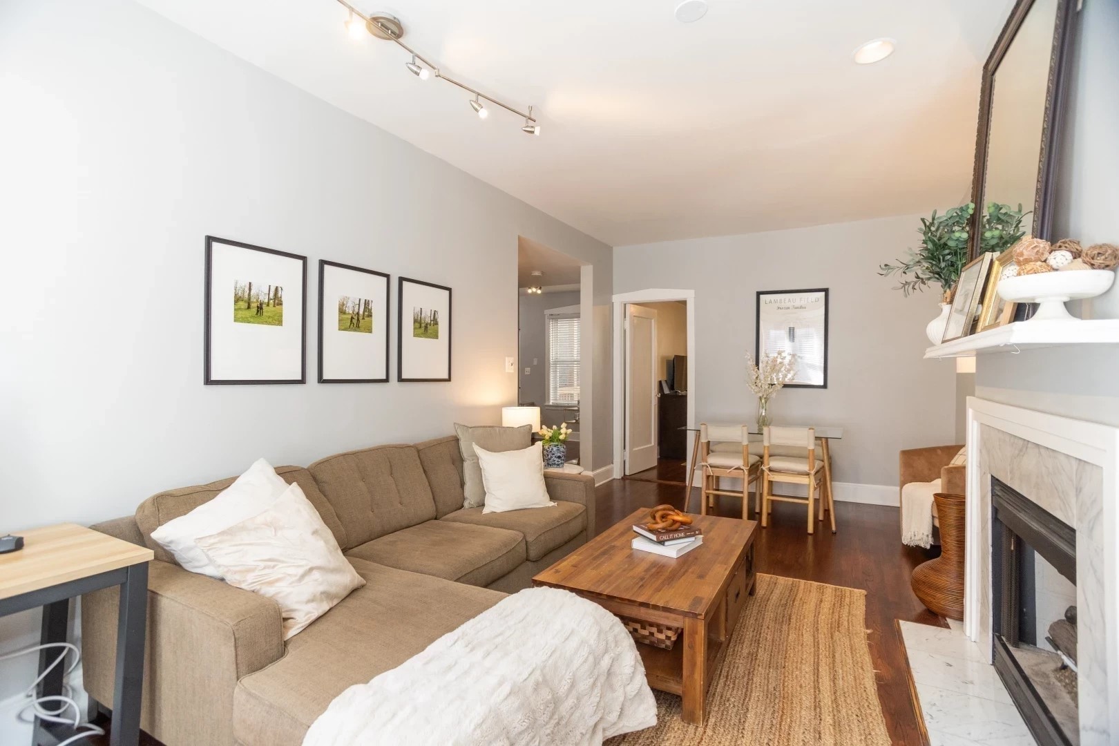 2026 North Burling Street, Unit 208 Chicago, IL 60614 - Photo 4 of 14 a living room with furniture and a fireplace